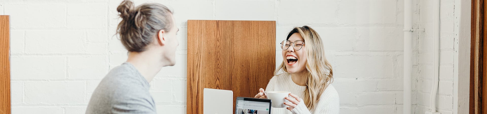 two-people-talking-laughing