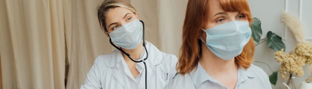 white-coat-doctor-with-patient