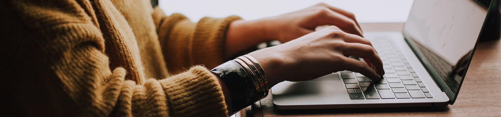 woman-typing-on-laptop